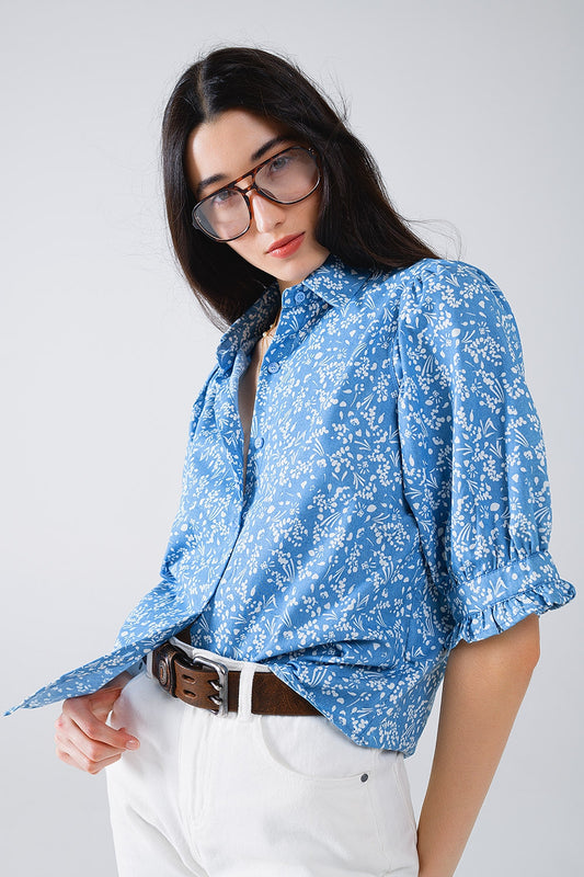 Q2 Blauwe blouse met bloemendessin en korte mouwen