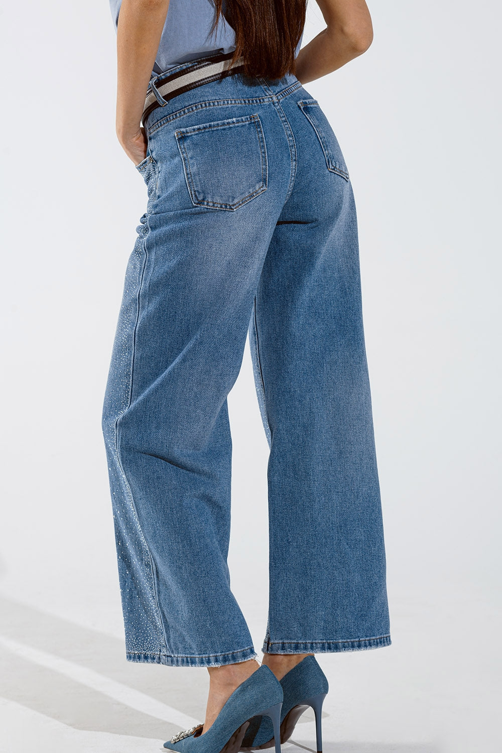 Jeans met wijde pijpen en opengewerkte knopen in Mid Wash