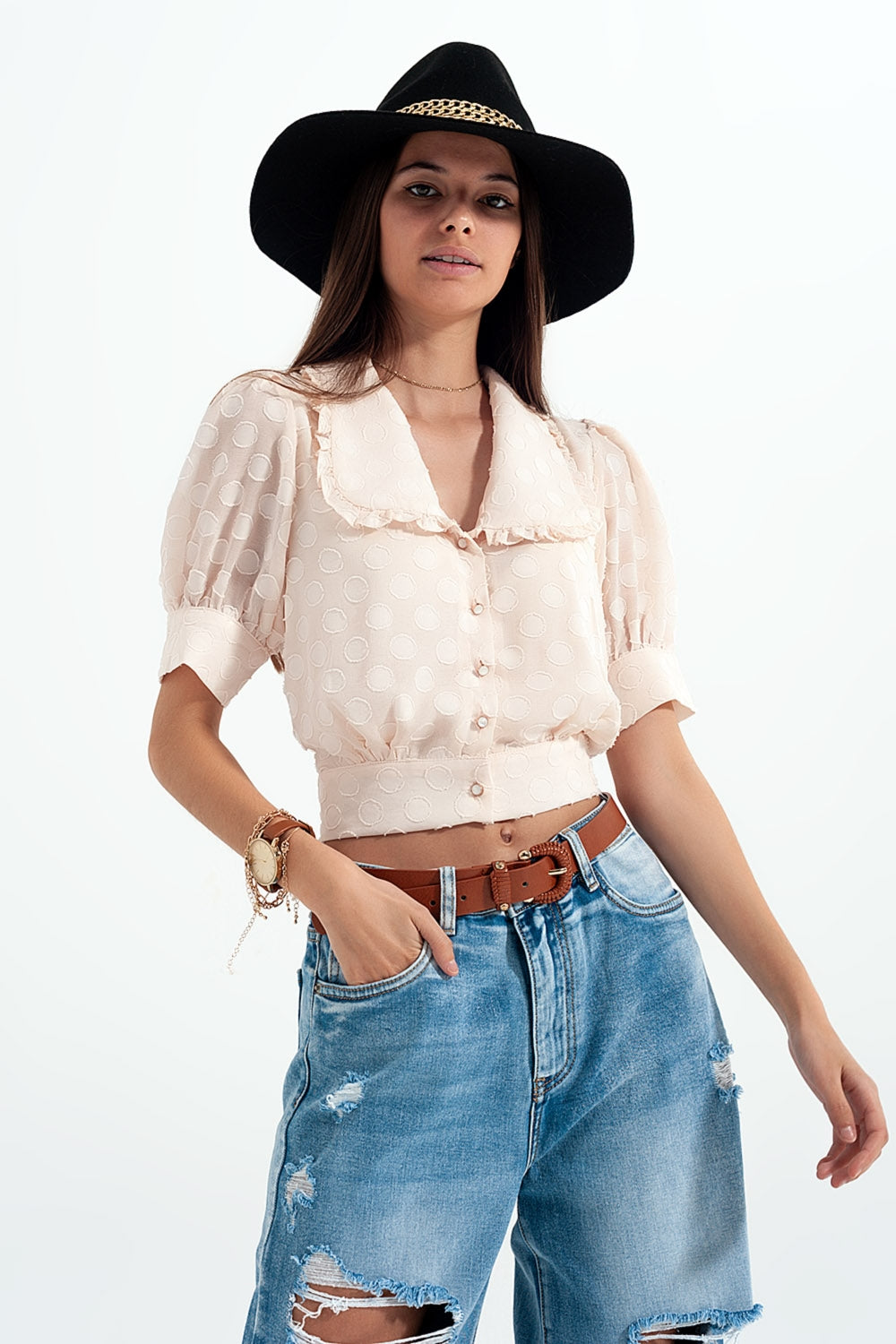 Beige polka dot blouse with bib collar and decorated buttons