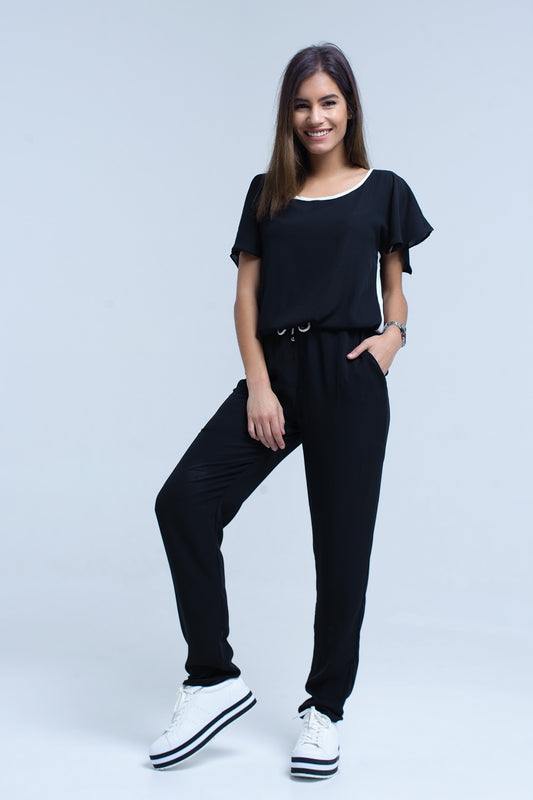 Q2 Black jumpsuit with short sleeve and ruffle detail