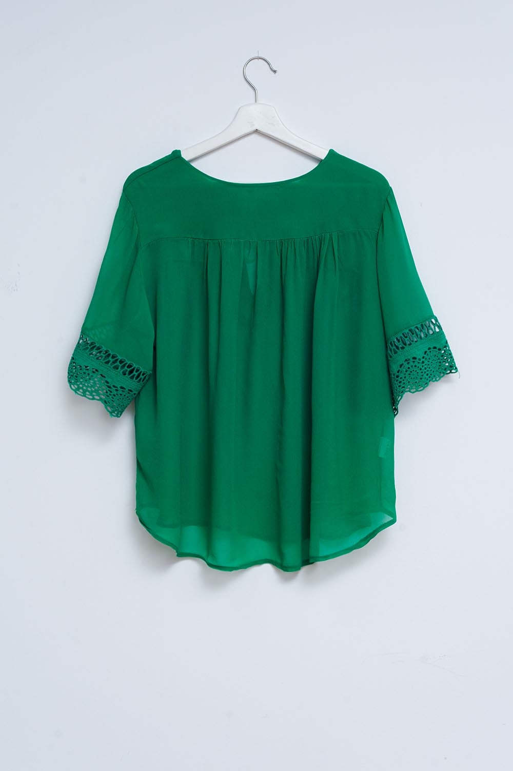 Blouse with embroidery and tie front in green