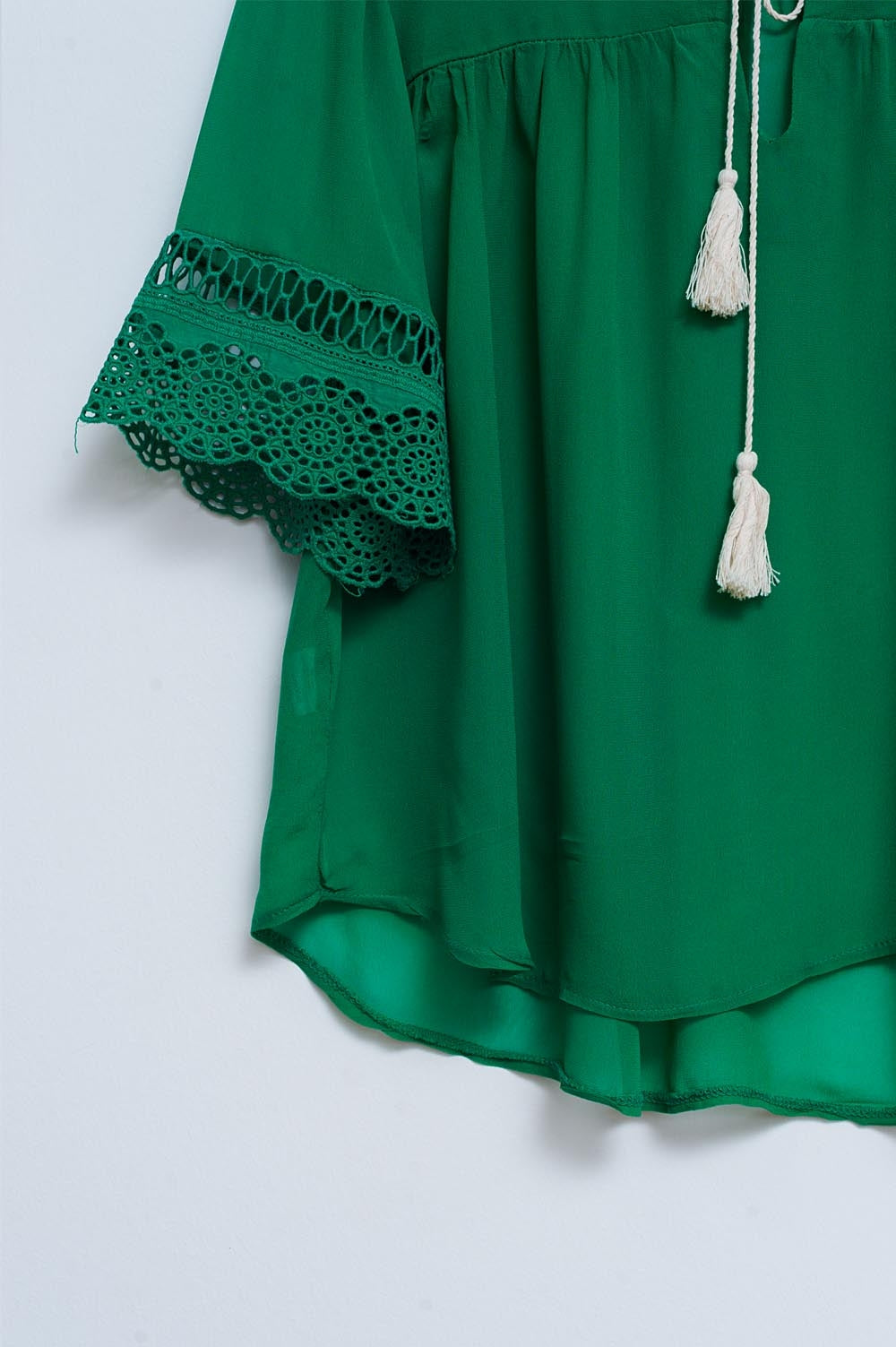 Blouse with embroidery and tie front in green