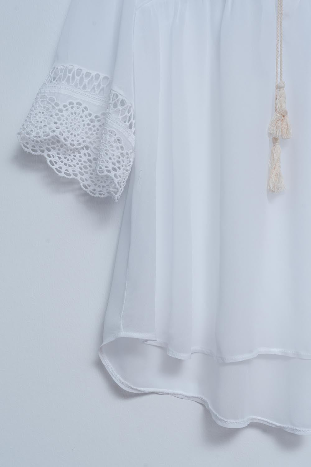 Blouse with embroidery and tie front in white