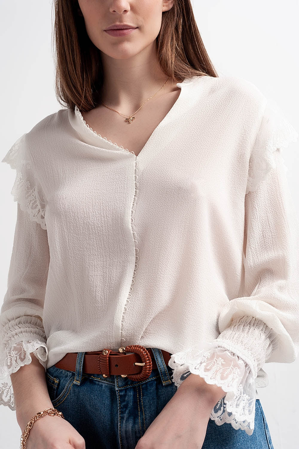 Blouse with large cuff sleeves in mother of pearl