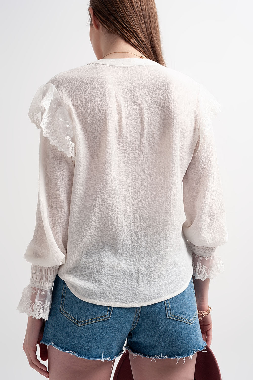 Blouse with large cuff sleeves in mother of pearl