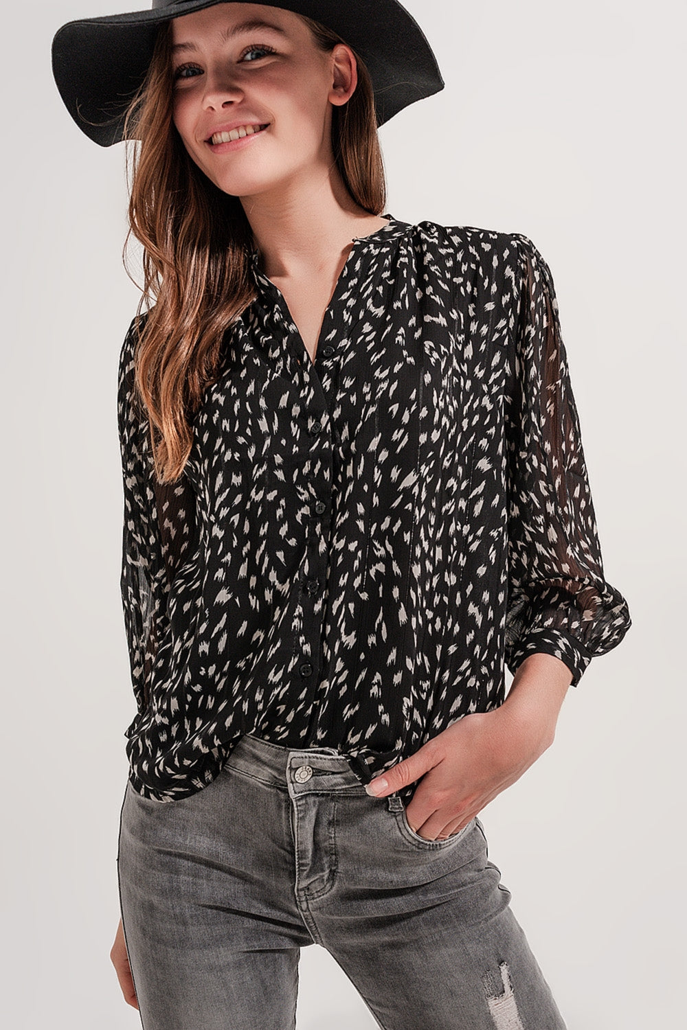 Blouse with print in black