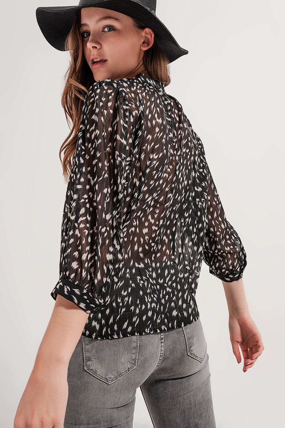 Blouse with print in black