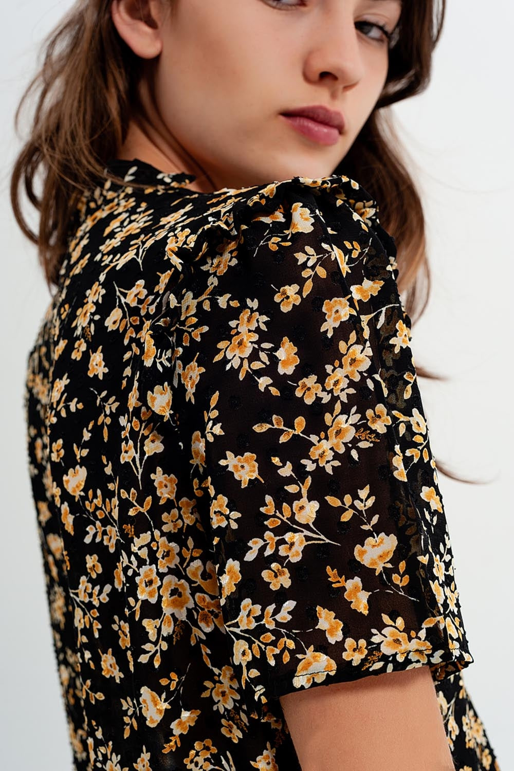 Blouse with ruffles in yellow floral print