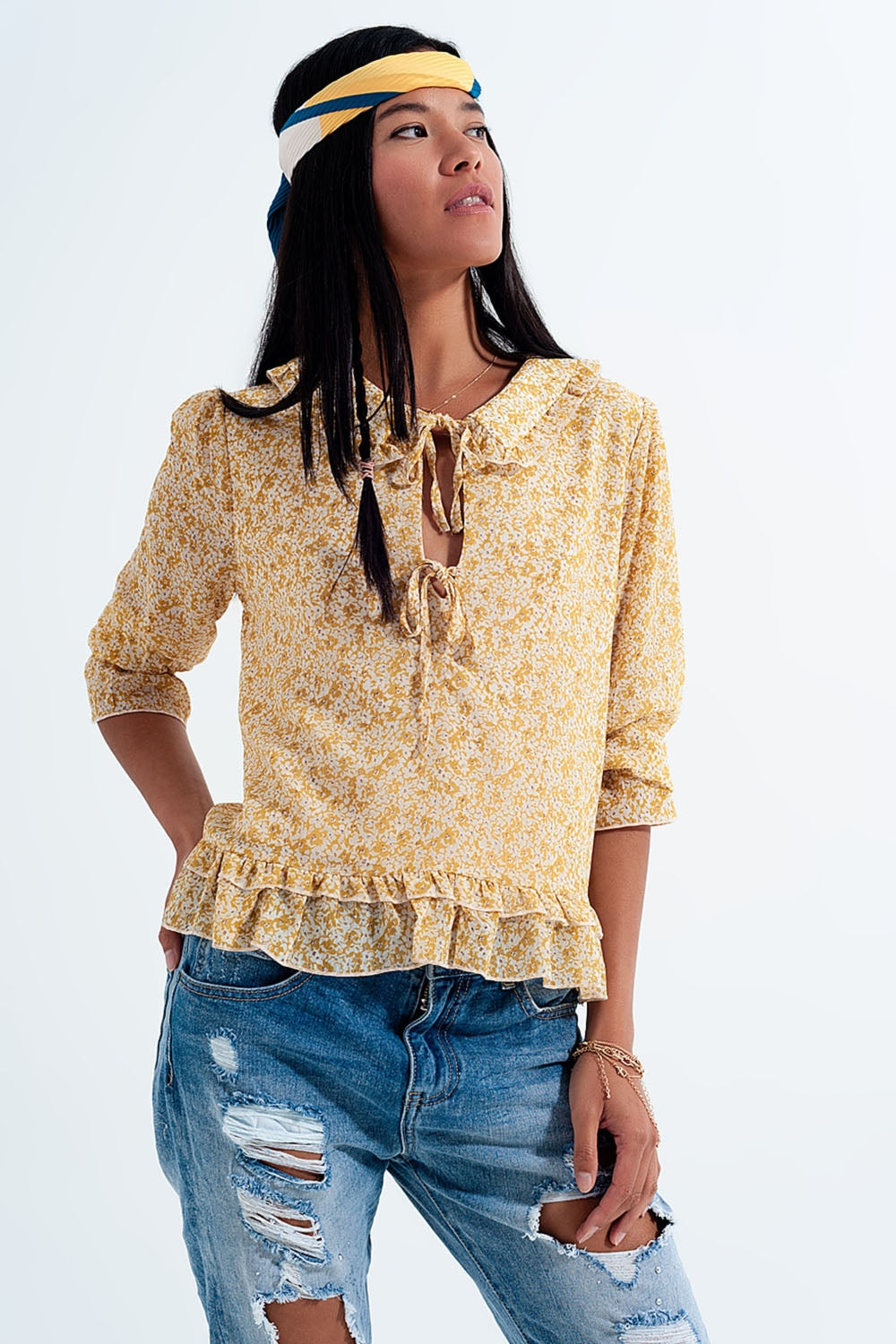 Chiffon blouse with bow on the front and fine yellow floral print