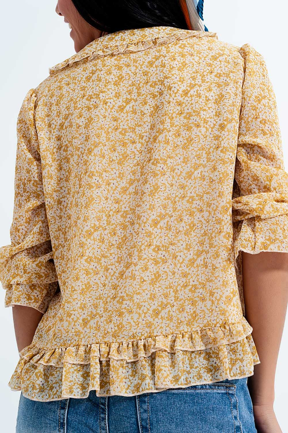 Chiffon blouse with bow on the front and fine yellow floral print