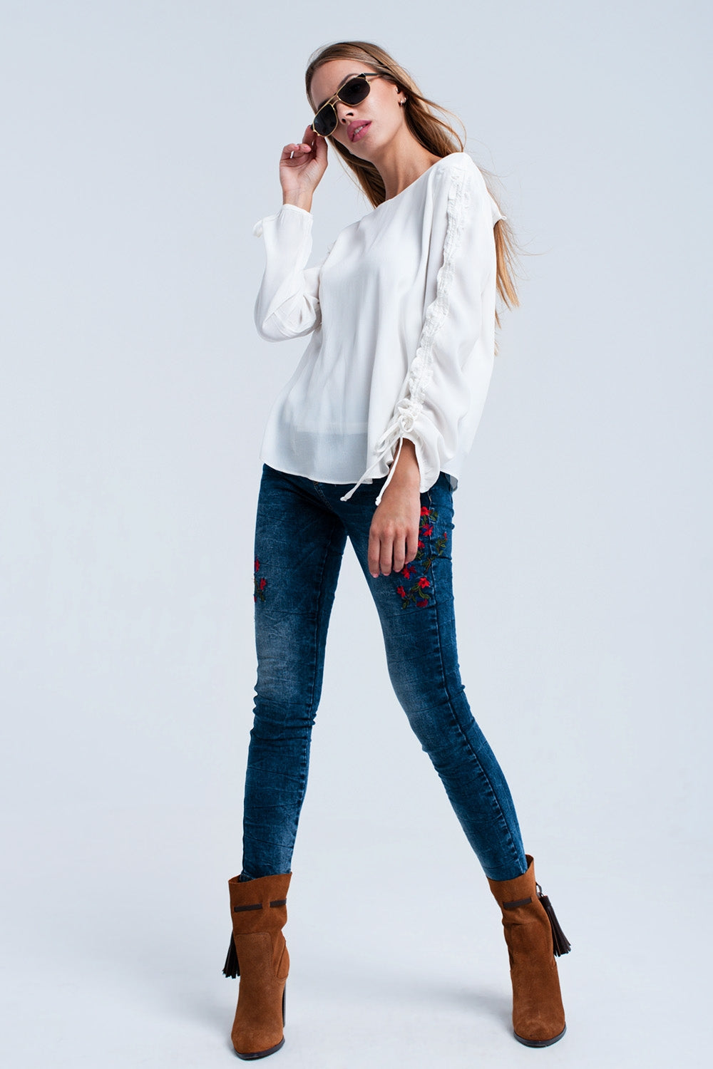 Crème vloeiende blouse