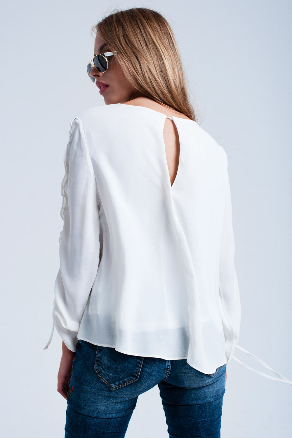 Crème vloeiende blouse