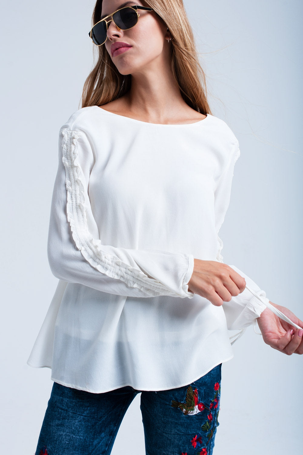 Crème vloeiende blouse