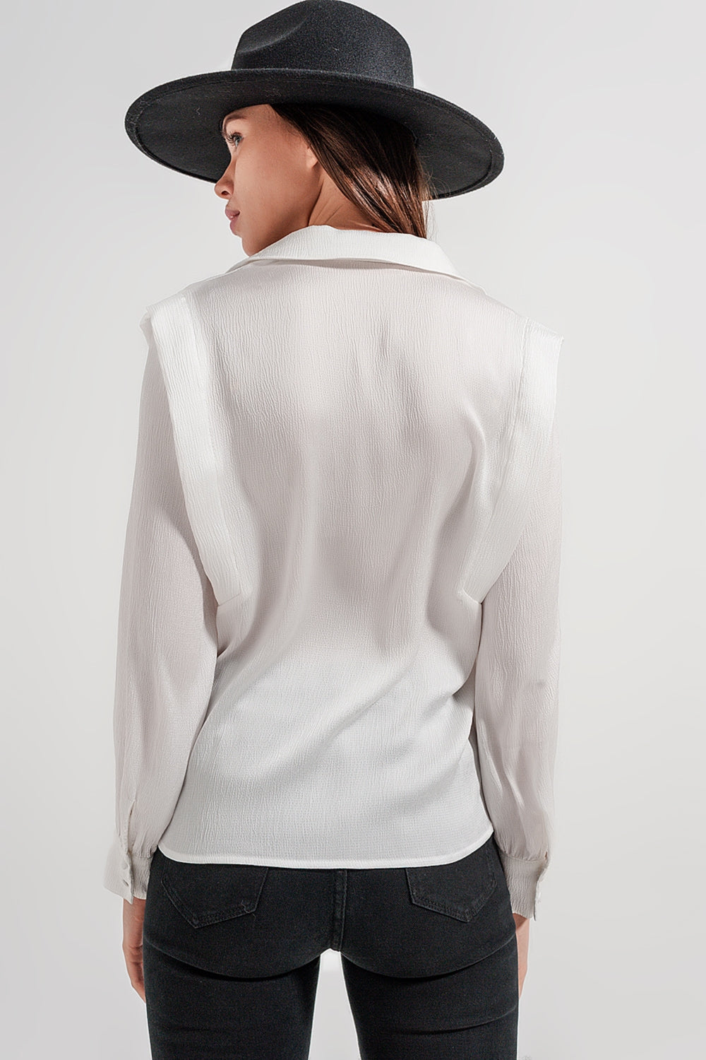 Ecru blouse with shoulder details