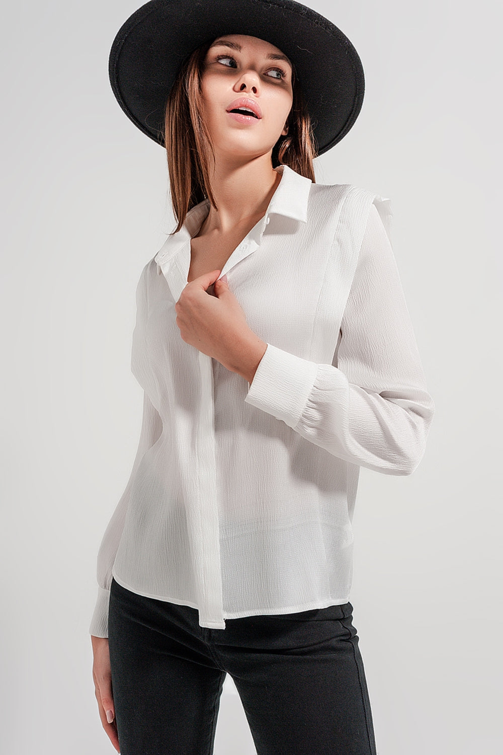 Ecru blouse with shoulder details