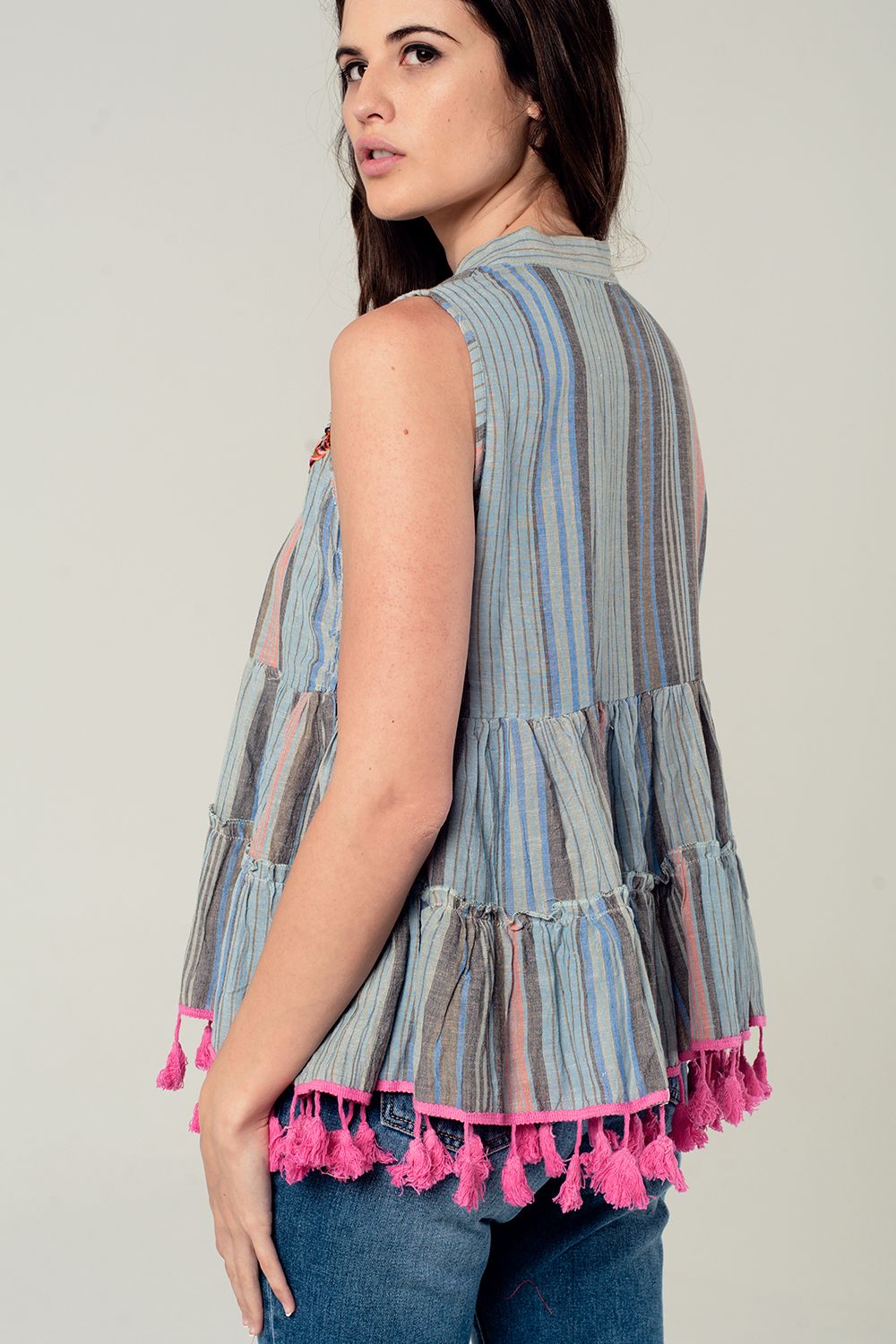 Gray sleeveless blouse with tassels and embroidery