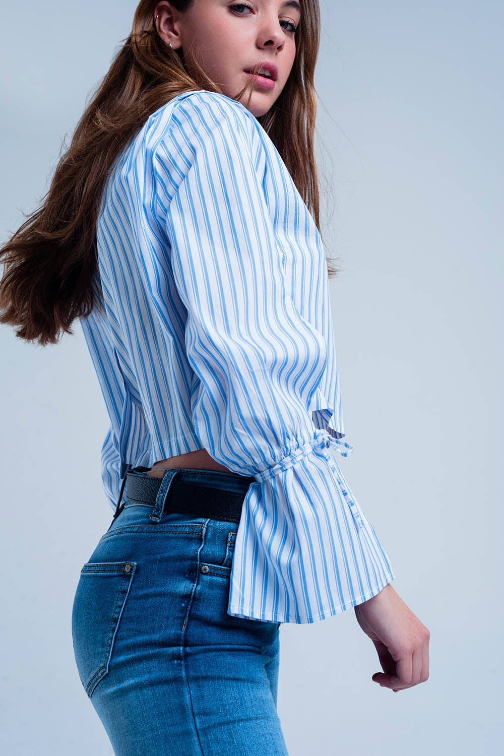 Short white blouse with blue stripes