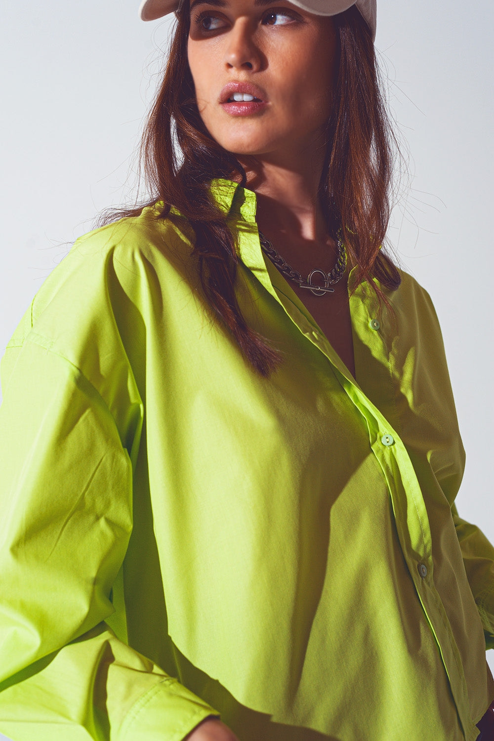 Loose-fitting blouse in lime green