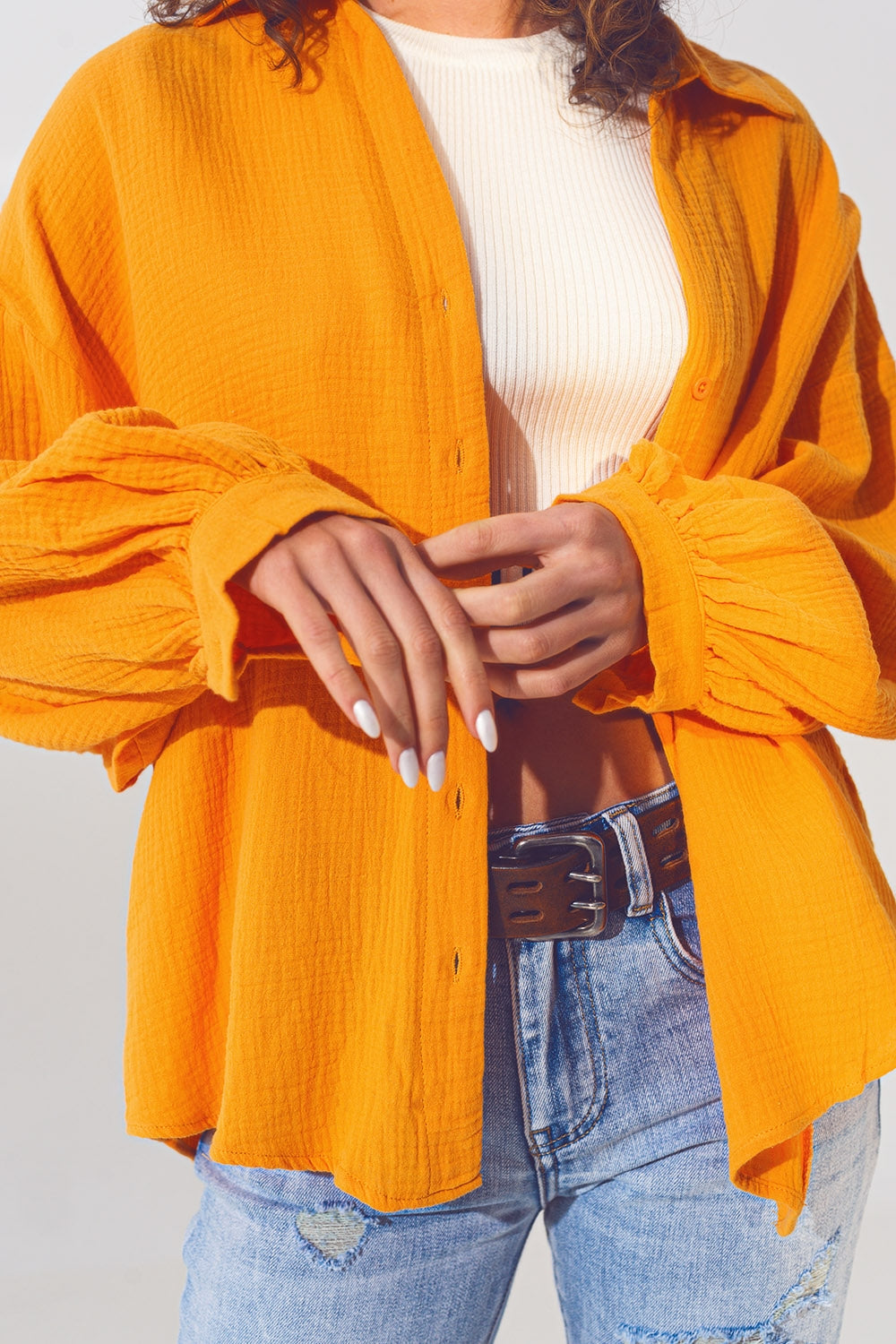 Loose-fitting blouse with texture in orange