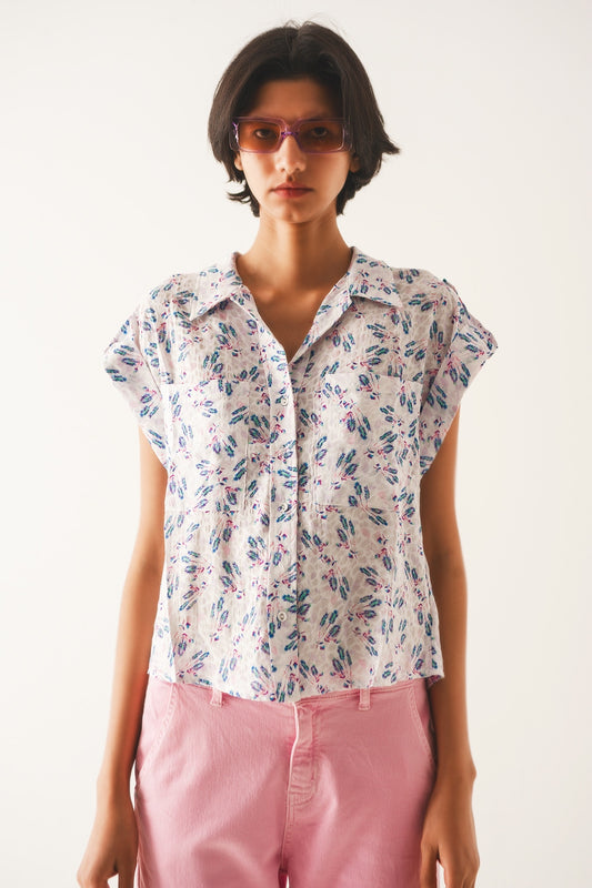 Q2 Paarse blouse met zakken en bloemenprint