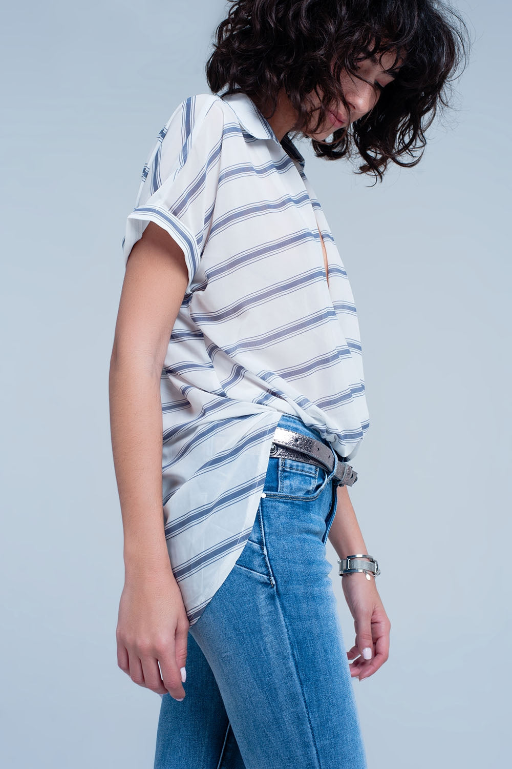 White with blue striped wrap over blouse