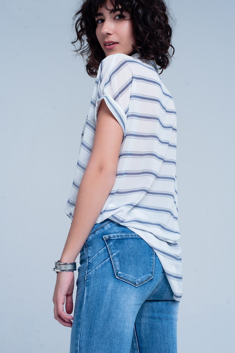 White with blue striped wrap over blouse