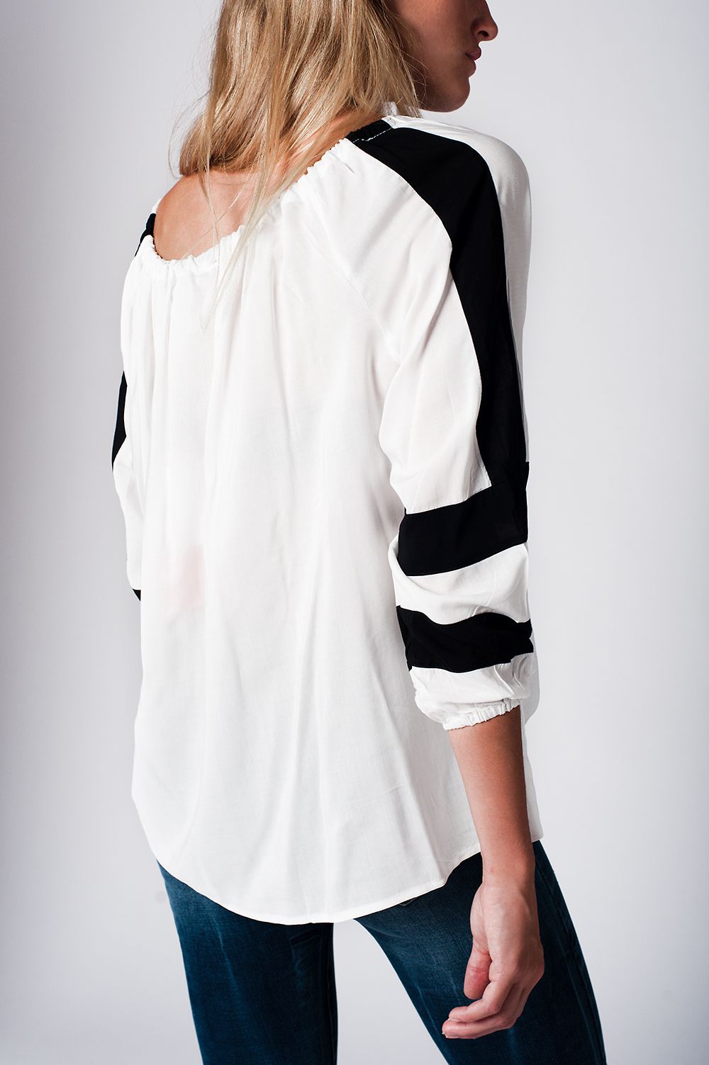 White blouse with black details